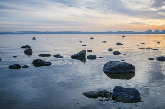 Beautiful sunrise on the sea. Views of Tallinn.
