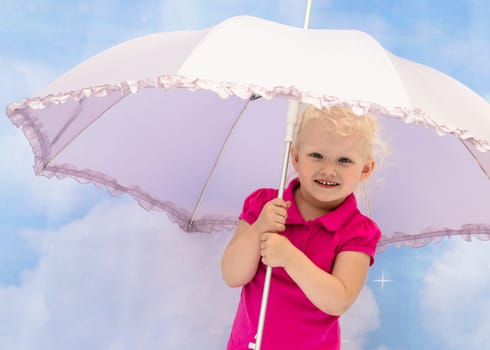 Portrait of the little girl under a umbrella