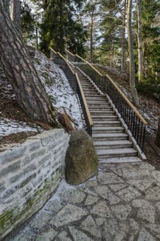 Beautiful staircase in the park leading up.