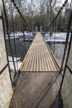 Bridge across the canal in the spring