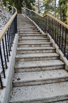 Beautiful staircase in the park leading up.