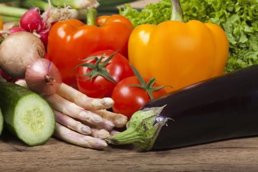 Mature aubergine lies ahead of vegetable assortment