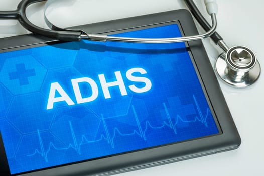 Tablet with the diagnosis OF ADHD on the display
