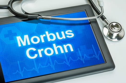 Tablet with the diagnosis of Crohn's disease on display