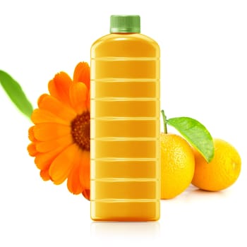 Orange juice in a plastic container jug with fresh orange and leaves on a white background.