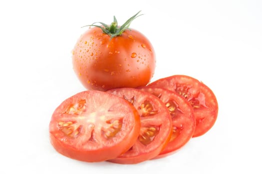Fresh red tomato with green stem on white background