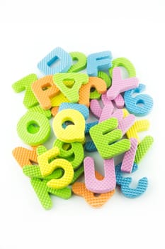 colorful alphabet letters on white background .