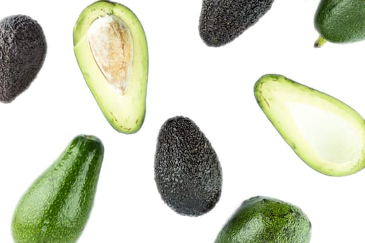 Black Ripe Avocados with leaves.