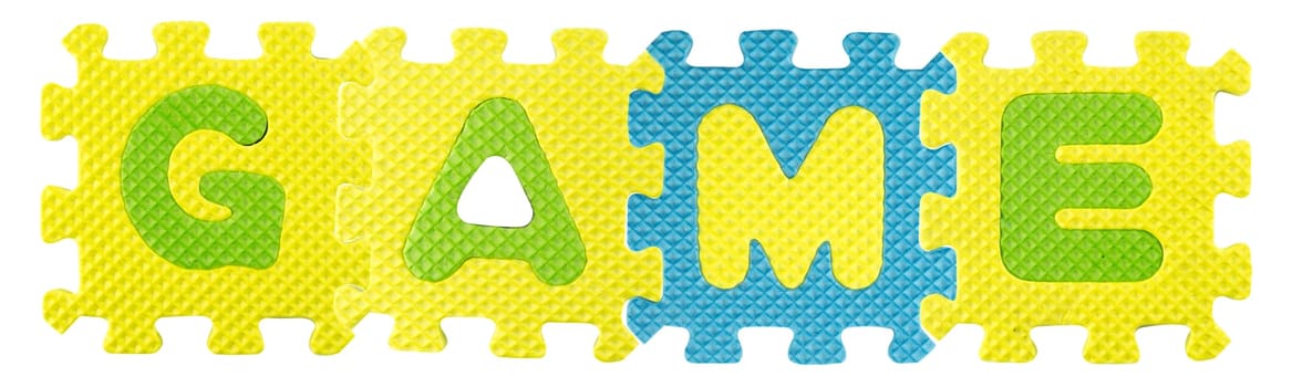 Game word created from Alphabet puzzle isloated on white background , with clipping path.