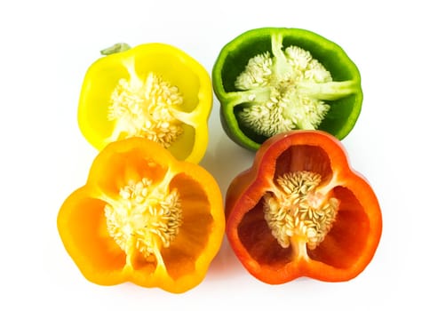 Parts of colorful sweet bell pepper on white background.