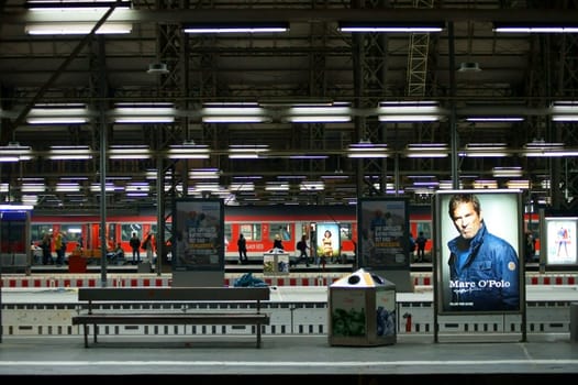 Frankfurt,Germany – March 29,2014: The interior shot of Frankfurt Central Station with unknown people,lighting and advertising posters on March 29,2014 in Frankfurt.
