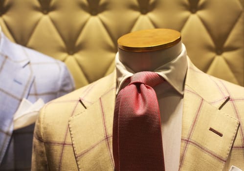 Business suits on shop mannequins high fashion retail display