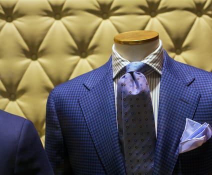 Business suits on shop mannequins high fashion retail display