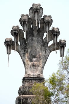 Buddhist figure,large Asian sculpture with snakes