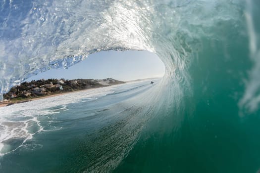 Ocean wave wall from storm swells crashing along shallow beach reef with natures  energy, a swimming photo of sea power.