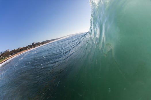 Ocean wave wall from storm swells crashing along shallow beach reef with natures  energy, a swimming photo of sea power.