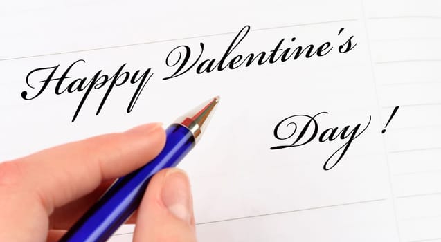 Happy valentine's day note on a white paper.