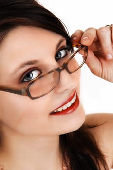 A extreme closeup pictures of the face of a beautiful young woman, holding.her glasses, isolated for white background..