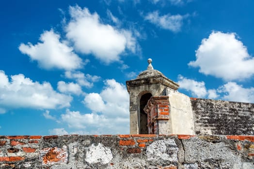 Blue sky behind a wall of San Felipe de Barajas castle in Cartagena, Colombia