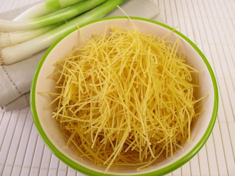 Thread noodles and spring onions