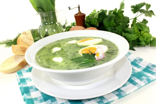 a green herb soup with eggs and creme Fraich