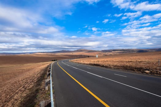 Road color scenic beauty contrast over rural countryside farming landscape