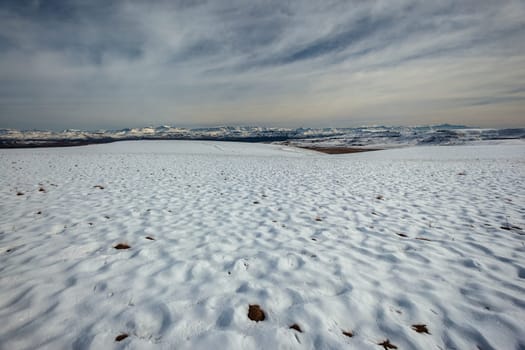 Mountains snow mist over rugged terrain scenic landscape