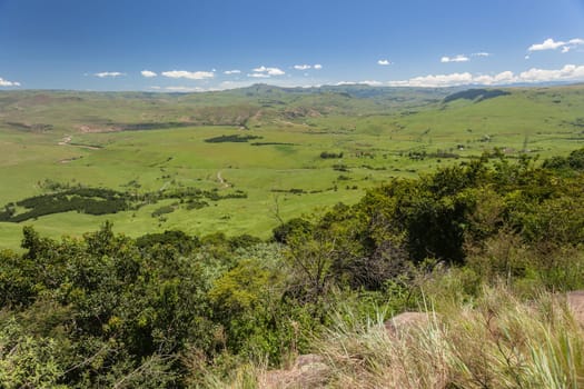 The Umkomass valley landscape in summer green blue  sky day in the Southern Drakensberg mountains South-Africa