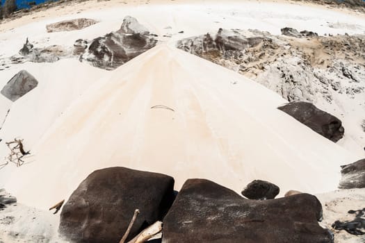Rainbow beach color sands and rocks alongside ocean sea embankment