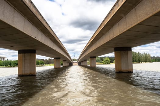 Bridge two together for vehicles expands crossing over lake water
