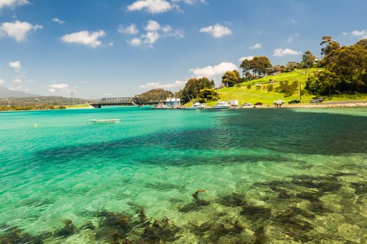 Scenic clean clear blue river lagoon waters of the Narooma coastal town landscape southern NSW Australia
