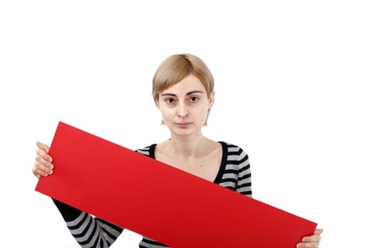 Young blonde woman holding a blank piece of paper.