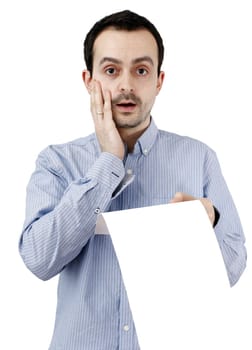 Young man holding a blank piece of paper