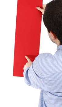 Young man holding a blank piece of paper