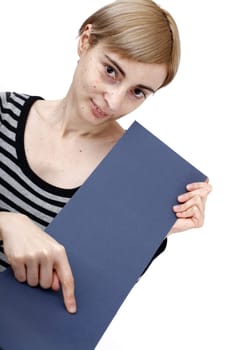 Young blonde woman holding a blank piece of paper.
