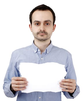 Young man holding a blank piece of paper