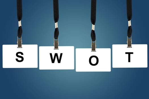 SWOT analysis word on badge with blue background