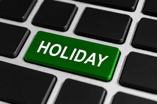 holiday green button on keyboard, business concept