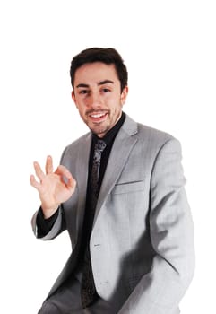 A young businessman in a black shirt and tie holding his hand up in a "good.job sign"" isolated for white background.."