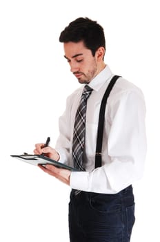 A young man in a white shirt and black tie and suspender writing on.his clipboard, isolated for white background..