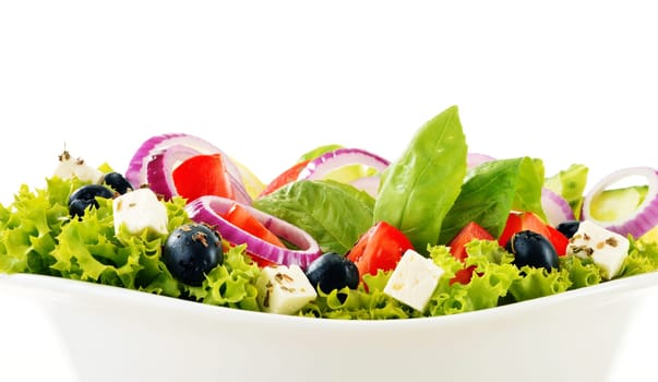 Vegetable salad bowl isolated on white background