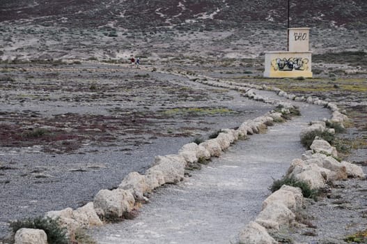 Travel Concept Background - Pathway in the Volcanic Desert Tenerife Canaty Islands Spain