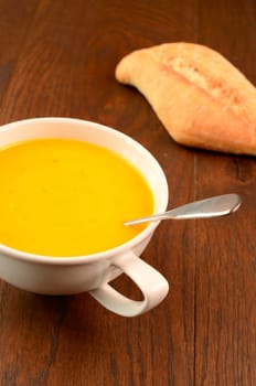 Hokkaido pumpkin cream soup on a kitchen table