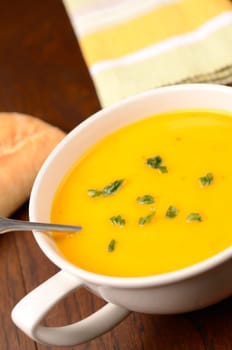 Hokkaido pumpkin cream soup on a kitchen table