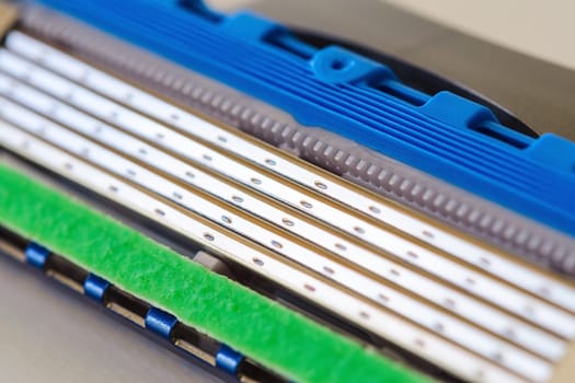 Sharp steel blades of new cartridge for safety disposable razor