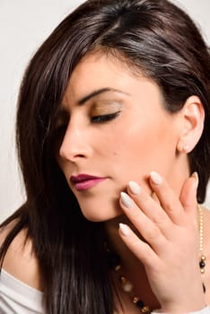 Portrait of a beautiful caucasian woman on a white background