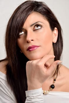 Portrait of a beautiful caucasian woman on a white background