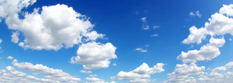 blue sky background with tiny clouds