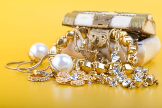 Jewelry gift box on yellow background