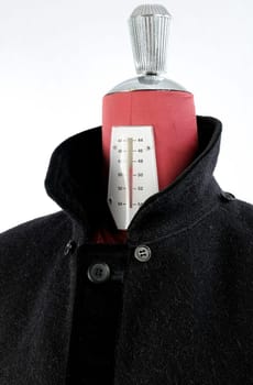 Woolen black coat, inserts and lining in velvet. Detachable hood.